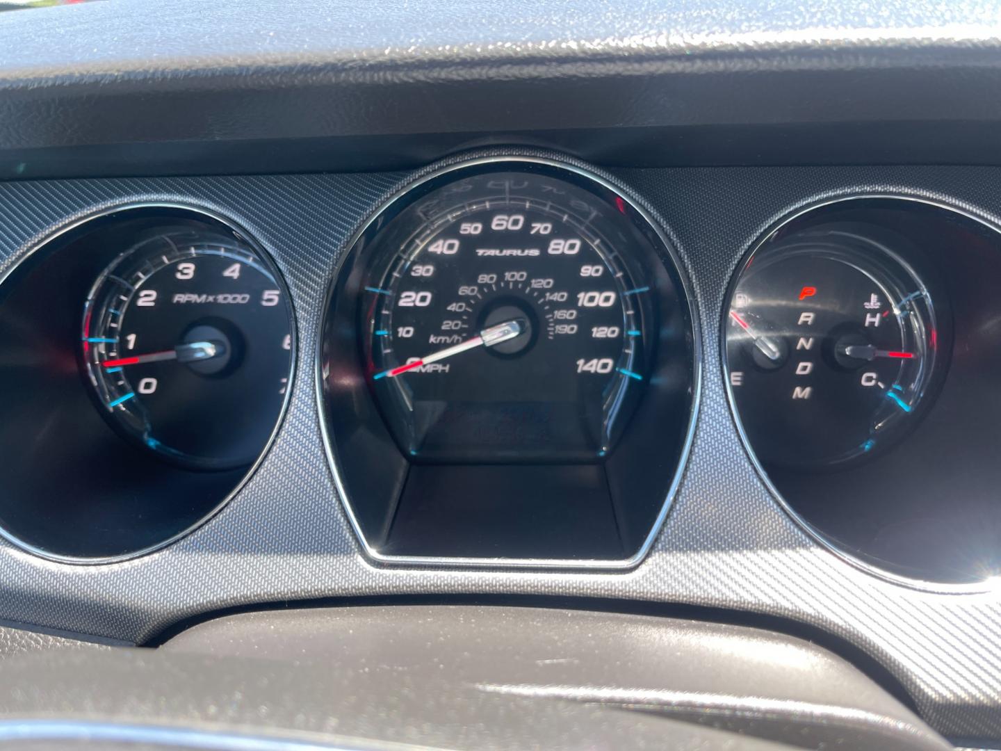 2010 White /Black Ford Taurus SHO (1FAHP2KT3AG) with an 3.5L V6 DOHC 24V TWIN TURBO engine, 6-Speed Automatic transmission, located at 11115 Chardon Rd. , Chardon, OH, 44024, (440) 214-9705, 41.580246, -81.241943 - This 2010 Ford Taurus SHO AWD is a high-performance variant of the Taurus sedan, powered by a potent 3.5L EcoBoost V6 engine that produces 365 hp and enables a 0-60 mph time of 5.2 seconds. It features an advanced AWD system, a 6-speed automatic transmission, and the SHO Performance Package. Notable - Photo#23